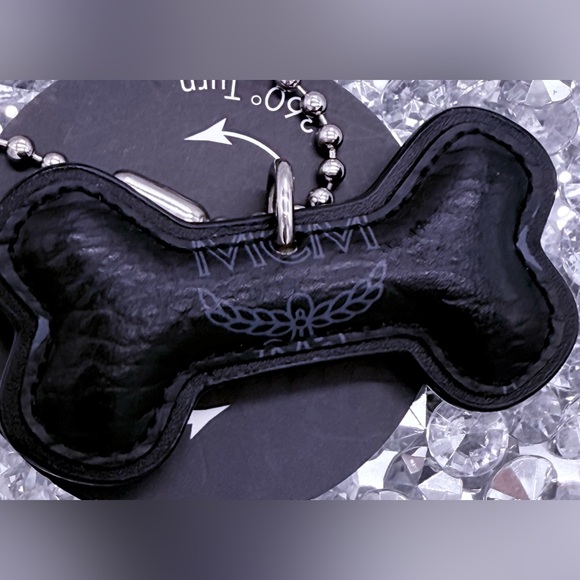MCM Accessories - MCM Black Visetos Dog Bone Bag Charm.